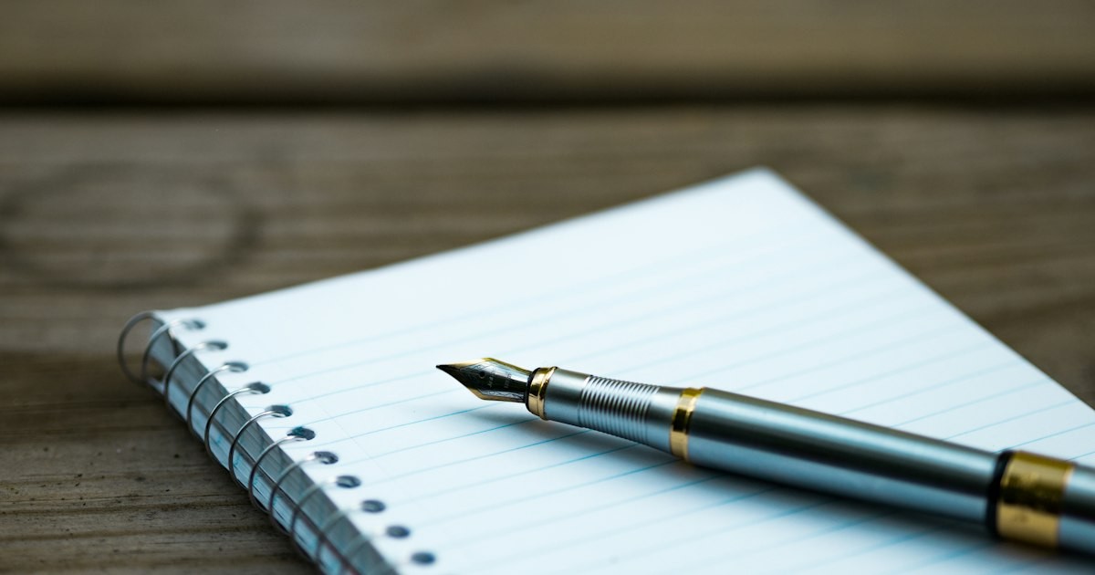 Structuring Your Dissertation Help for Chapter Success 22 Graduate student organizing dissertation chapters and notes at a desk